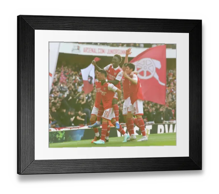 Framed Print : Arsenal's Unstoppable Duo: Martinelli and Saka Score First Goals Against Liverpool (2022-23)