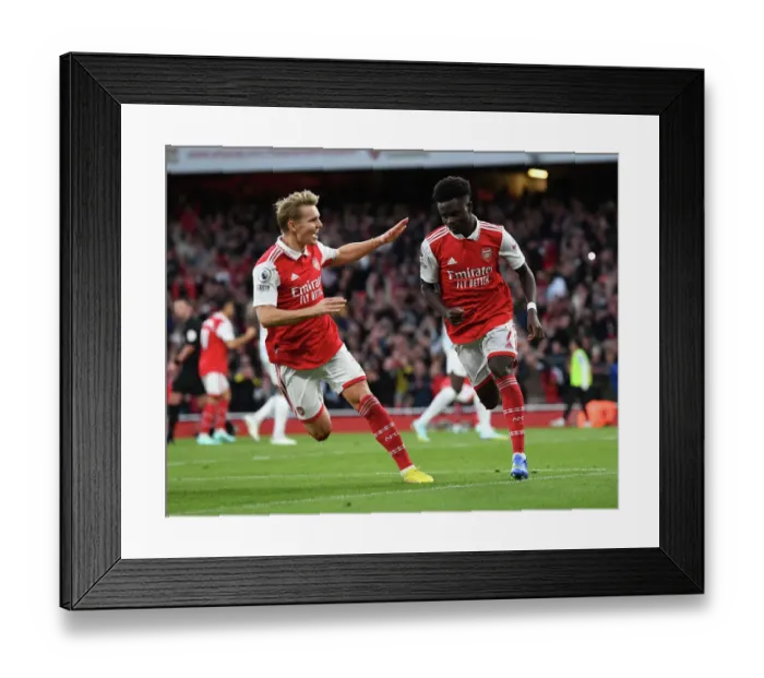 Framed Print : Arsenal's Triumph: Saka Scores the Third Goal Against Liverpool in the 2022-23 Premier League Framed Print : Arsenal's Triumph: Saka Scores the Third Goal Against Liverpool in the 2022-23 Premier League