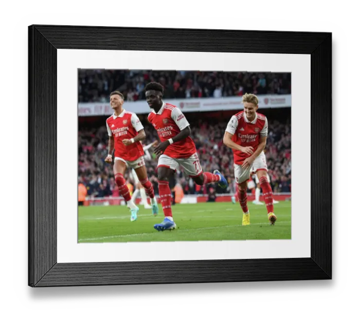 Framed Print : Arsenal's Triumph: Saka Scores Third in Arsenal FC vs. Liverpool FC (2022-23)