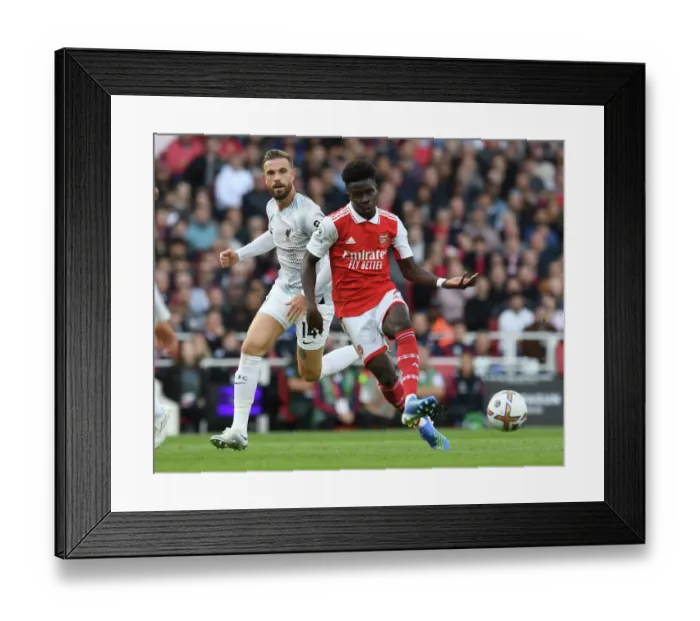 Framed Print : Arsenal's Bukayo Saka Evades Liverpool's Jordan Henderson in Premier League Showdown Framed Print : Arsenal's Bukayo Saka Evades Liverpool's Jordan Henderson in Premier League Showdown