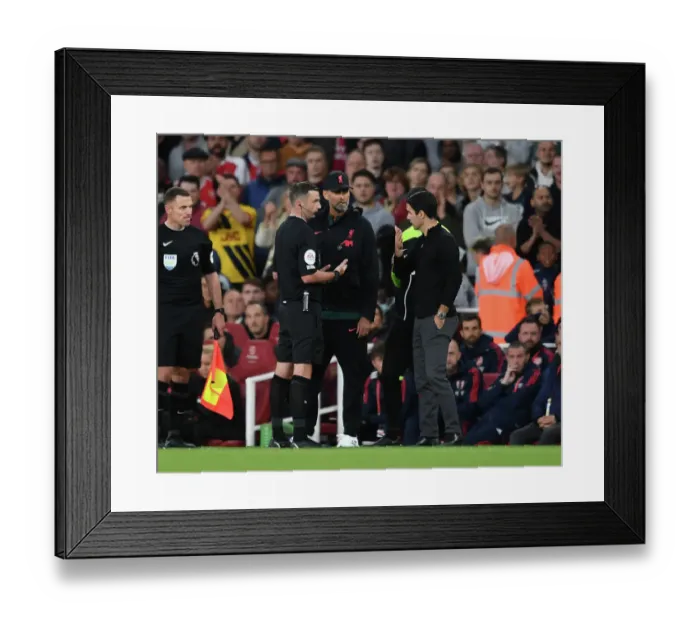 Framed Print : Arteta vs. Klopp: Intense Face-Off with Referee Oliver in Arsenal vs. Liverpool Premier League Clash Framed Print : Arteta vs. Klopp: Intense Face-Off with Referee Oliver in Arsenal vs. Liverpool Premier League Clash