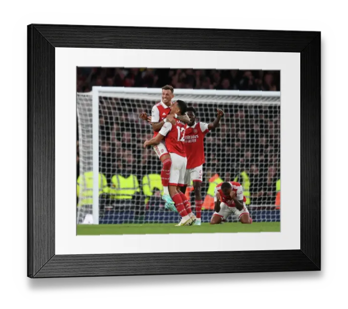 Framed Print : Arsenal's Triumph: White, Saliba, Partey Celebrate Victory over Liverpool in 2022-23 Premier League Framed Print : Arsenal's Triumph: White, Saliba, Partey Celebrate Victory over Liverpool in 2022-23 Premier League