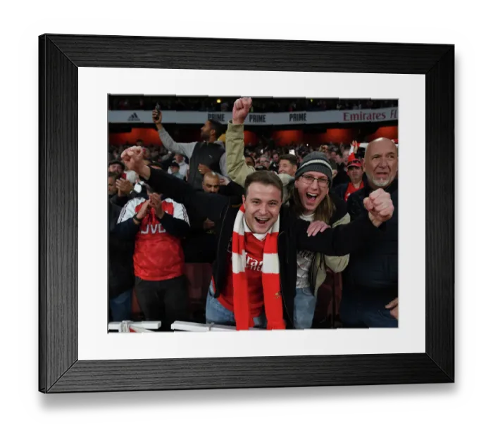 Framed Print : Arsenal Fans Celebrate Victory Over Liverpool in Premier League Clash at Emirates Stadium