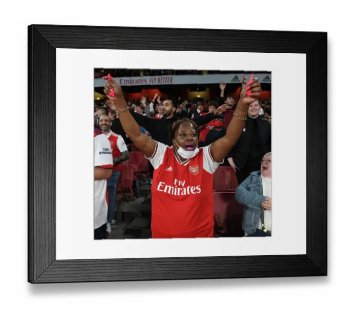 Framed Print : Arsenal Triumphs Over Liverpool: Electric Atmosphere as Fans Celebrate Premier League Victory