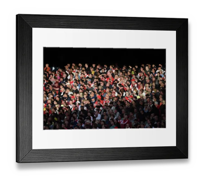 Framed Print : Passionate Clash: Arsenal vs. Liverpool at Emirates Stadium, Premier League 2022-23 - A Sea of Fans