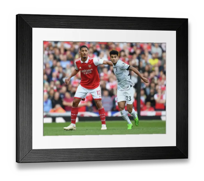 Framed Print : Saliba vs. Diaz: A Premier League Showdown at Emirates Stadium