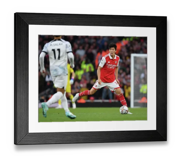 Framed Print : Arsenal's Tomiyasu Makes Emirates Debut Against Liverpool (2022-23)