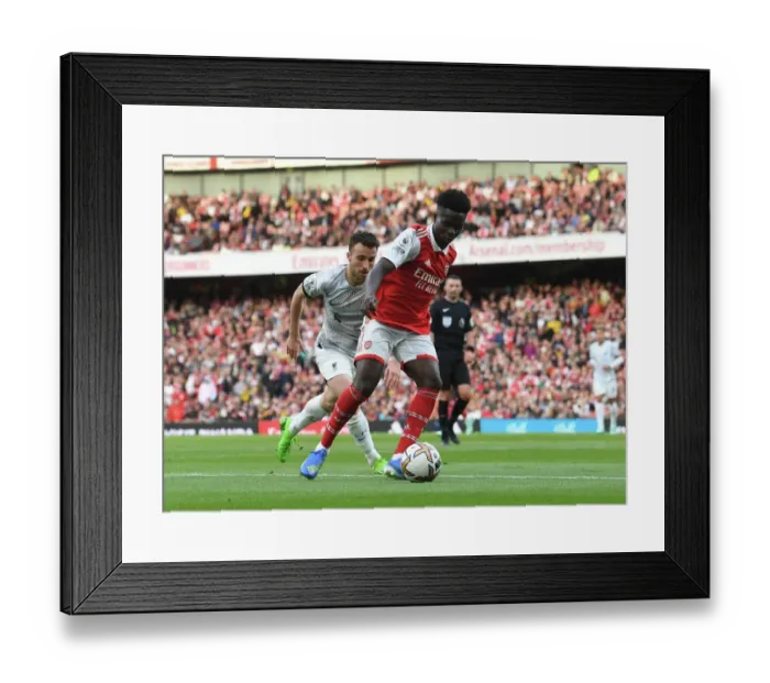 Framed Print : Arsenal's Bukayo Saka Faces Liverpool in the Premier League Showdown, 2022-23