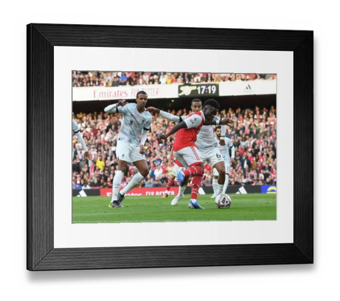 Framed Print : Bukayo Saka vs. Liverpool: Clash at the Emirates - Arsenal's Star Wings Battle in the Premier League Framed Print : Bukayo Saka vs. Liverpool: Clash at the Emirates - Arsenal's Star Wings Battle in the Premier League