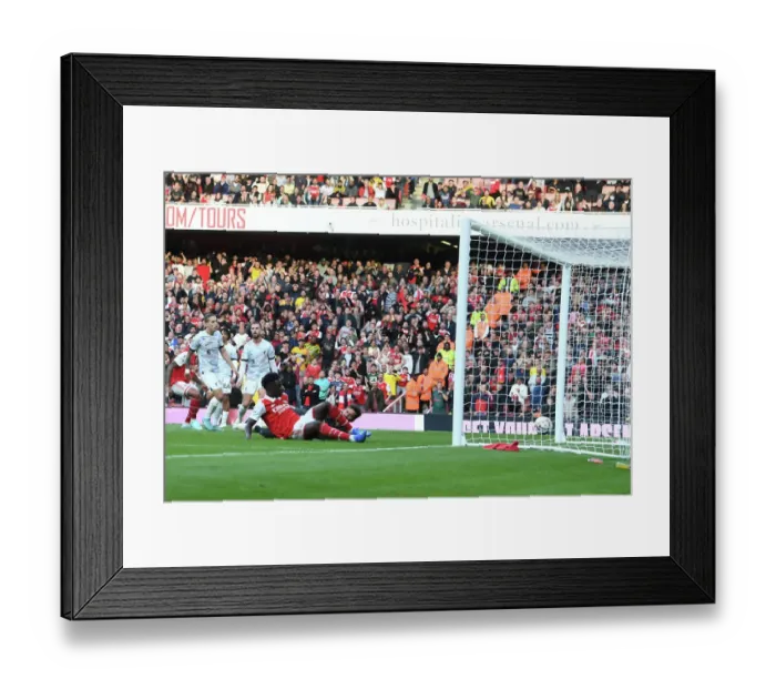 Framed Print : Saka Strikes Again: Arsenal's Triumph Over Liverpool in the 2022-23 Premier League