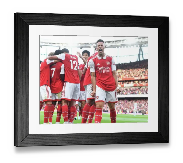 Framed Print : Arsenal's Double Strike: Martinelli & Saka Celebrate against Liverpool in the Premier League (2022-23)