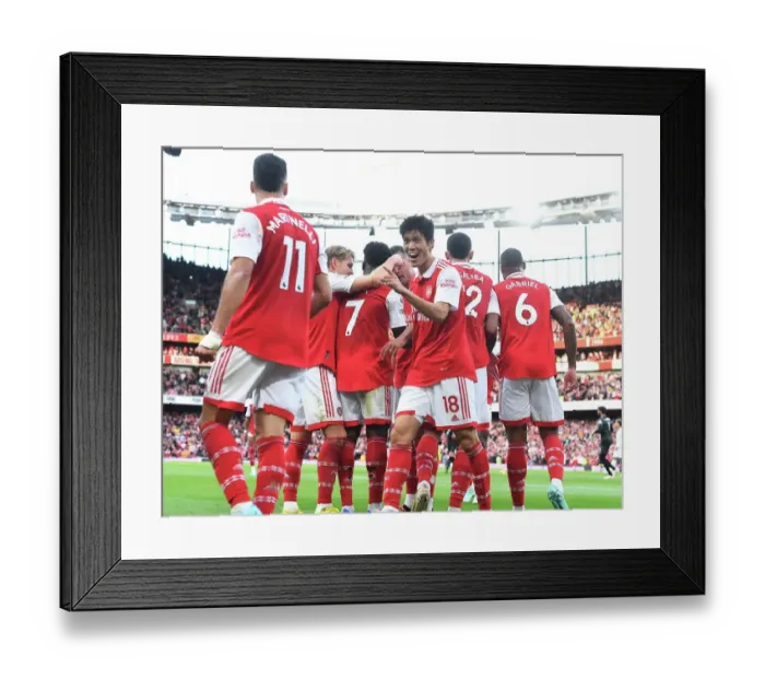 Framed Print : Arsenal's Tomiyasu and Saka: Unstoppable Duo Strikes Twice Against Liverpool in the 2022-23 Premier League
