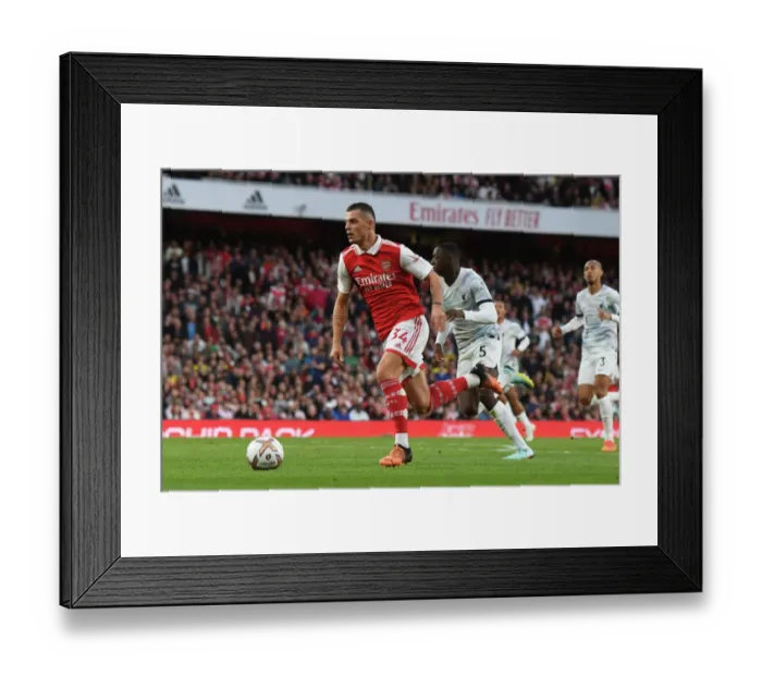 Framed Print : Arsenal's Midfield Showdown: Xhaka vs. Liverpool - Battle for Premier League Supremacy (2022-23)