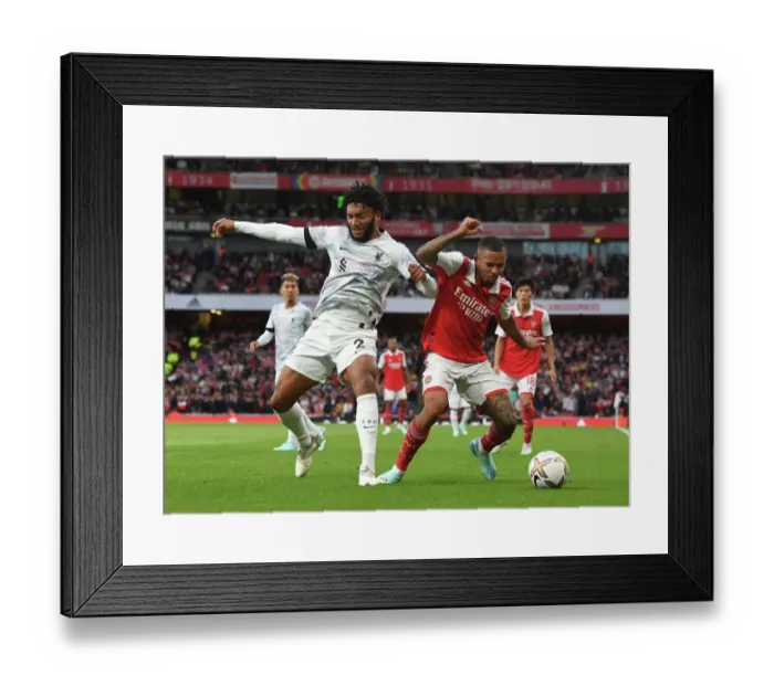 Framed Print : Arsenal vs. Liverpool: A Premier League Battle - Clash of Titans Framed Print : Arsenal vs. Liverpool: A Premier League Battle - Clash of Titans