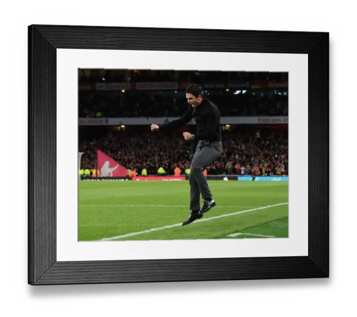Framed Print : Arsenal's Victory: Mikel Arteta Celebrates as Arsenal Defeat Liverpool in the Premier League