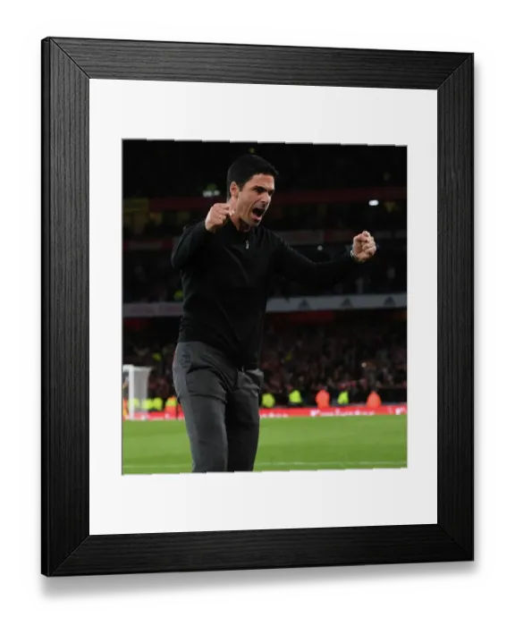 Framed Print : Arsenal Secure Hard-Fought Victory Over Liverpool: Mikel Arteta's Emotional Celebration
