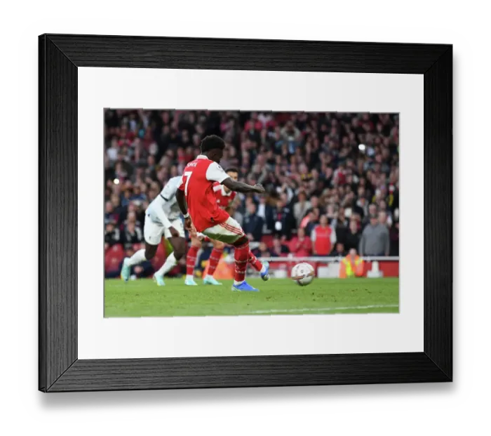 Framed Print : Saka Scores Penalty: Arsenal's Triumph Over Liverpool in 2022-23 Premier League