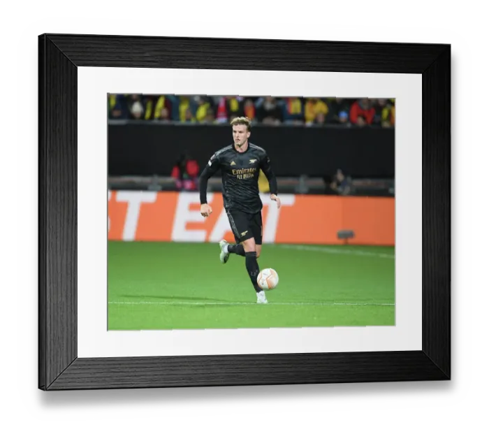 Framed Print : Rob Holding in Action: Arsenal Takes on Bodø / Glimt in Europa League 2022-23
