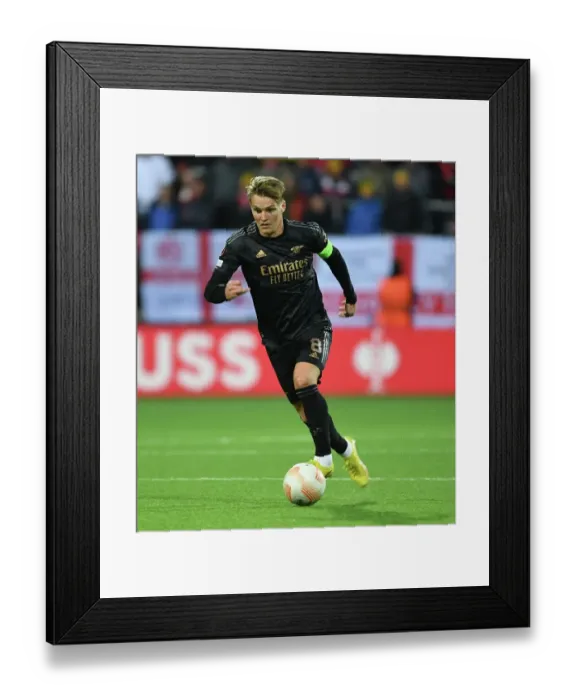 Framed Print : Martin Odegaard Shines: Arsenal Secures Europa League Victory over Bodø / Glimt Framed Print : Martin Odegaard Shines: Arsenal Secures Europa League Victory over Bodø / Glimt