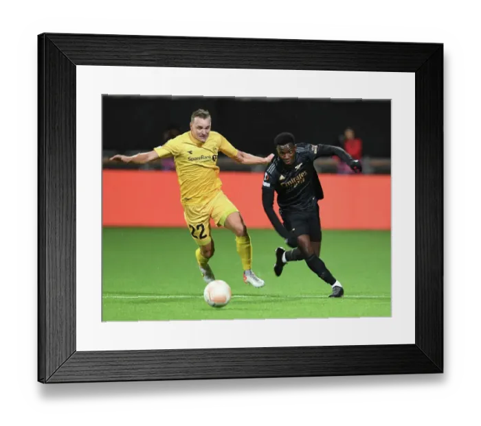 Framed Print : Eddie Nketiah Scores Spectacular Goal Past Bodø / Glimt's Marius Lode in Europa League Match