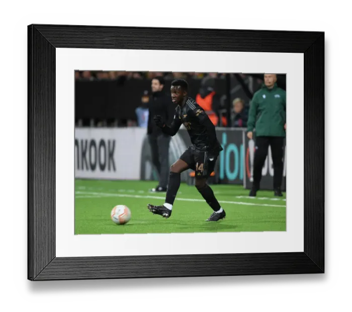 Framed Print : Arsenal's Eddie Nketiah in Action against Bodø / Glimt in Europa League Group A Framed Print : Arsenal's Eddie Nketiah in Action against Bodø / Glimt in Europa League Group A