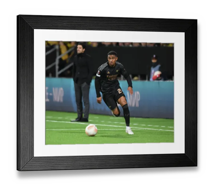 Framed Print : Arsenal's Reiss Nelson in Action against Bodø / Glimt in Europa League Group A