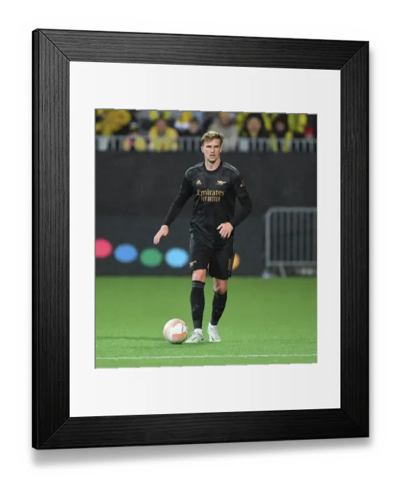 Framed Print : Rob Holding in Action: Arsenal's Europa League Battle at Bodø / Glimt (October 2022)