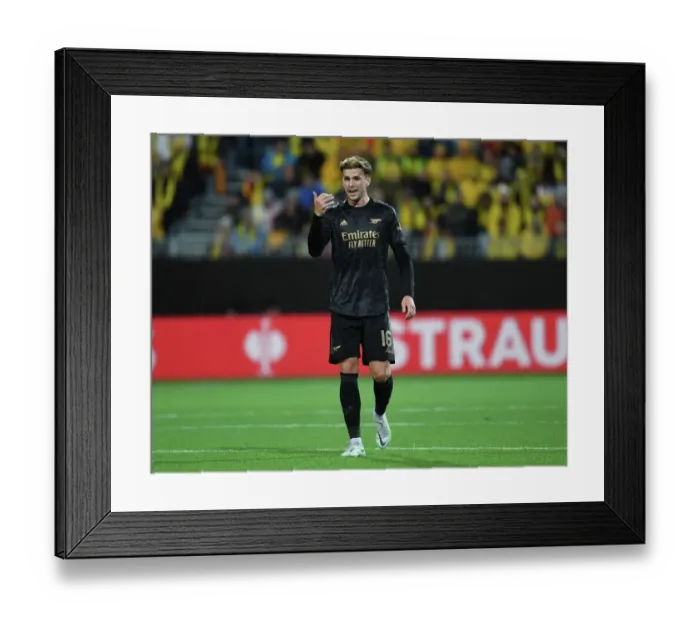 Framed Print : Arsenal's Rob Holding in Action against Bodø / Glimt in UEFA Europa League Group A