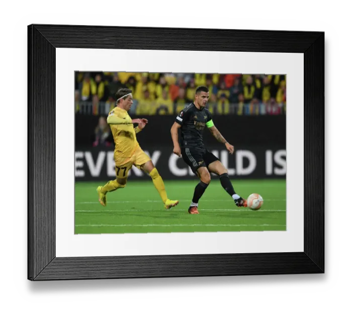Framed Print : Granit Xhaka's Powerful Surge: Arsenal's Europa League Triumph over Bodø / Glimt