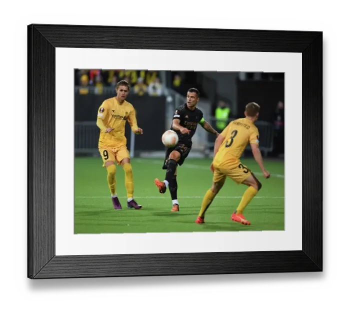 Framed Print : Granit Xhaka in Action: Arsenal vs. Bodø / Glimt, UEFA Europa League 2022-23