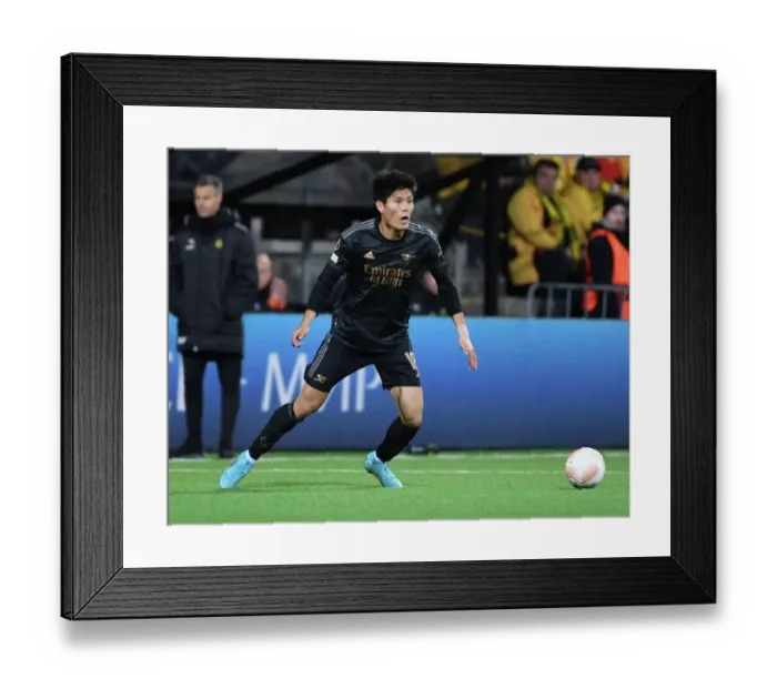 Framed Print : Arsenal's Takehiro Tomiyasu in Action against Bodø / Glimt in UEFA Europa League