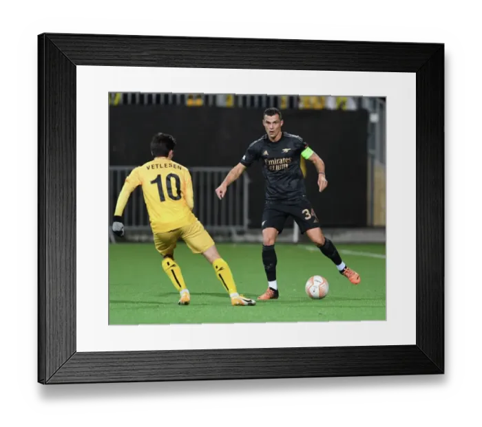 Framed Print : Granit Xhaka: Arsenal's Midfield Maestro Dazzles in Europa League Clash vs. Bodø / Glimt Framed Print : Granit Xhaka: Arsenal's Midfield Maestro Dazzles in Europa League Clash vs. Bodø / Glimt