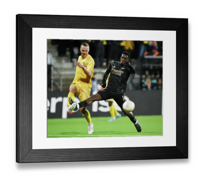Framed Print : Arsenal's Eddie Nketiah Clashes with Bodo / Glimt's Sery Larsen in Europa League Match Framed Print : Arsenal's Eddie Nketiah Clashes with Bodo / Glimt's Sery Larsen in Europa League Match