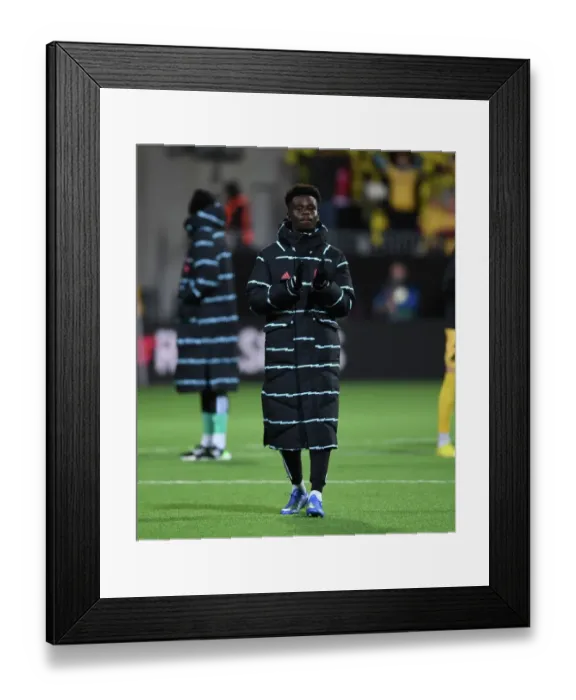 Framed Print : Bukayo Saka's Applause: Arsenal's Victory in Bodø / Glimt UEFA Europa League Match Framed Print : Bukayo Saka's Applause: Arsenal's Victory in Bodø / Glimt UEFA Europa League Match