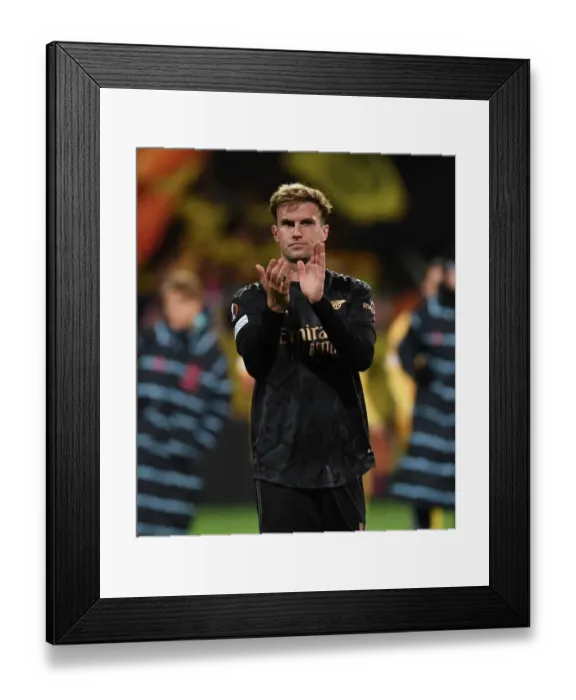 Framed Print : Arsenal's Rob Holding Celebrates with Fans after UEFA Europa League Victory over Bodø / Glimt Framed Print : Arsenal's Rob Holding Celebrates with Fans after UEFA Europa League Victory over Bodø / Glimt