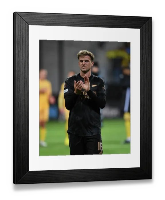 Framed Print : Arsenal's Rob Holding Celebrates with Fans after Europa League Victory over Bodø / Glimt
