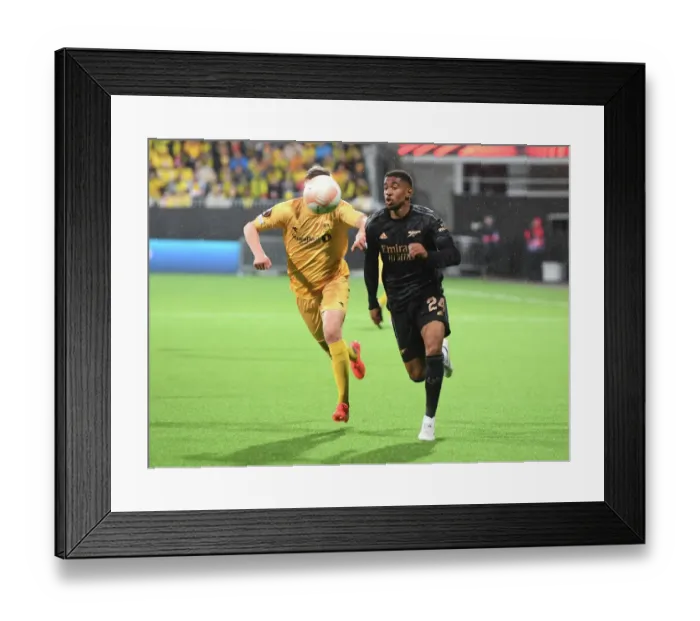 Framed Print : Arsenal's Reiss Nelson in Action: Bodø / Glimt vs. Arsenal (UEFA Europa League 2022-23)