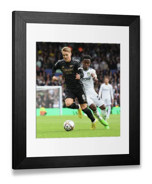 Framed Print : Odegaard vs Sinisterra: Battle at Elland Road - Leeds United vs Arsenal FC, Premier League 2022-23 Framed Print : Odegaard vs Sinisterra: Battle at Elland Road - Leeds United vs Arsenal FC, Premier League 2022-23