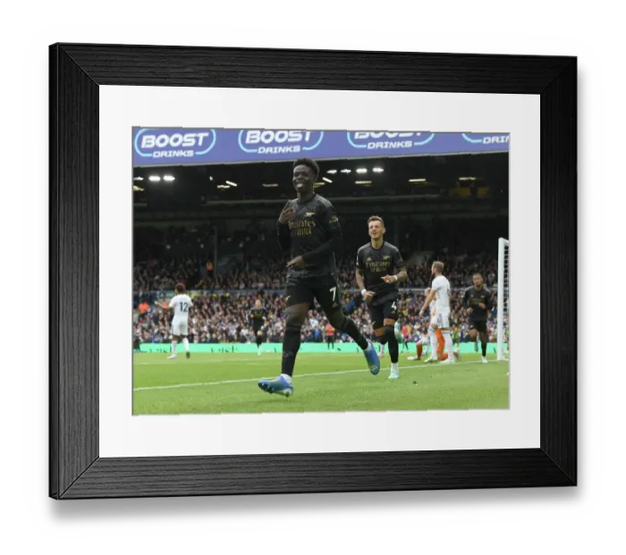 Framed Print : Bukayo Saka Scores: Arsenal Triumph Over Leeds United in Premier League Showdown