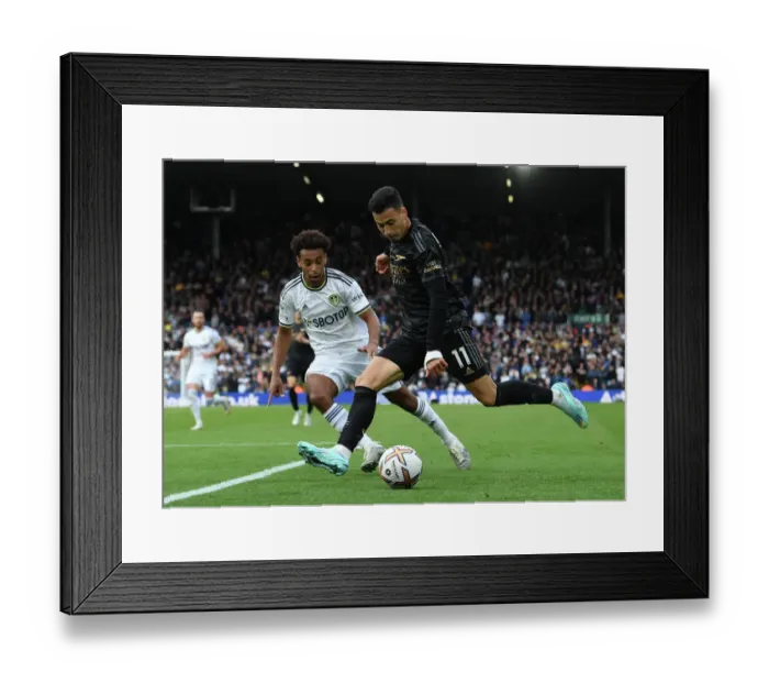 Framed Print : Martinelli Faces Off Against Adams: Leeds United vs. Arsenal FC, Premier League 2022-23 Framed Print : Martinelli Faces Off Against Adams: Leeds United vs. Arsenal FC, Premier League 2022-23