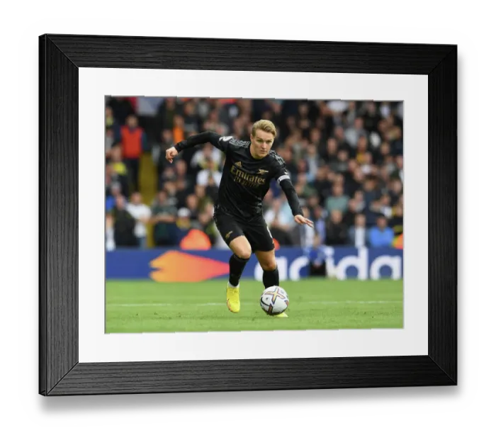 Framed Print : Martin Odegaard's Brilliant Performance: Arsenal Triumphs Over Leeds United in the Premier League 2022-23