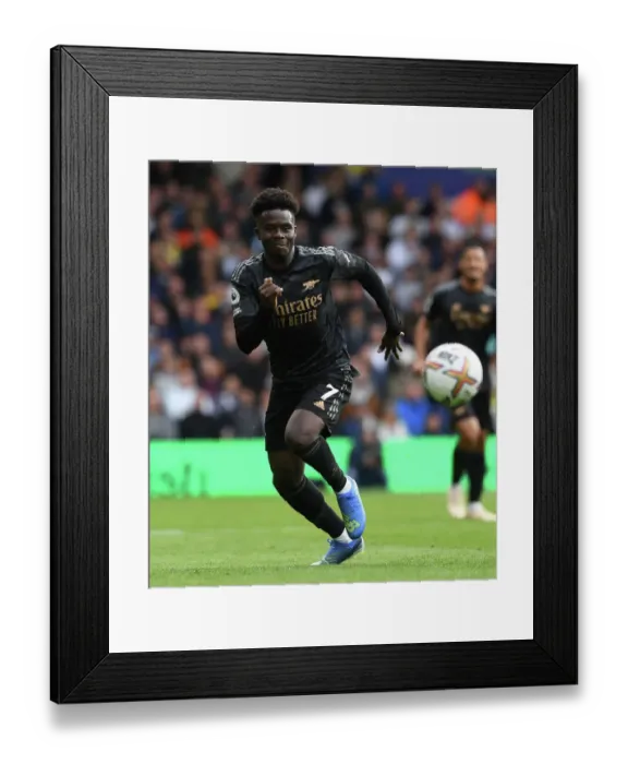 Framed Print : Bukayo Saka's Brilliant Performance: Arsenal FC Triumphs Over Leeds United in the Premier League 2022-23