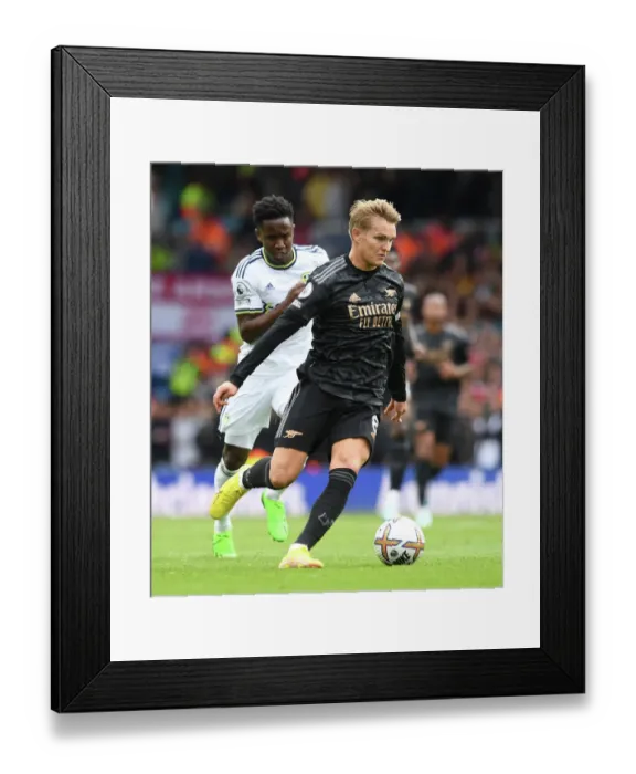 Framed Print : Martin Odegaard vs Luis Sinisterra: Clash of the Midfield Maestros - Leeds United vs Arsenal FC, Premier League 2022-23 Framed Print : Martin Odegaard vs Luis Sinisterra: Clash of the Midfield Maestros - Leeds United vs Arsenal FC, Premier League 2022-23
