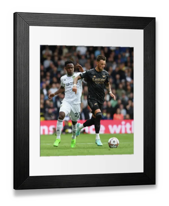 Framed Print : Arsenal's Ben White Faces Off Against Leeds Luis Sinisterra in Premier League Clash Framed Print : Arsenal's Ben White Faces Off Against Leeds Luis Sinisterra in Premier League Clash