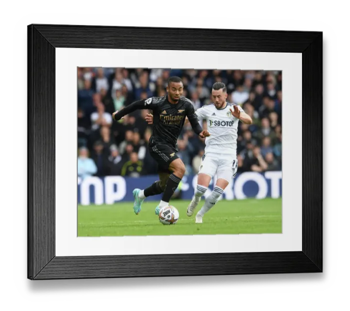 Framed Print : Gabriel Jesus vs Jack Harrison: Clash at Elland Road - Leeds United vs Arsenal FC, Premier League 2022-23