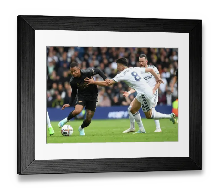 Framed Print : Gabriel Jesus vs Marc Roca: Intense Battle in Leeds United vs Arsenal FC Premier League Clash