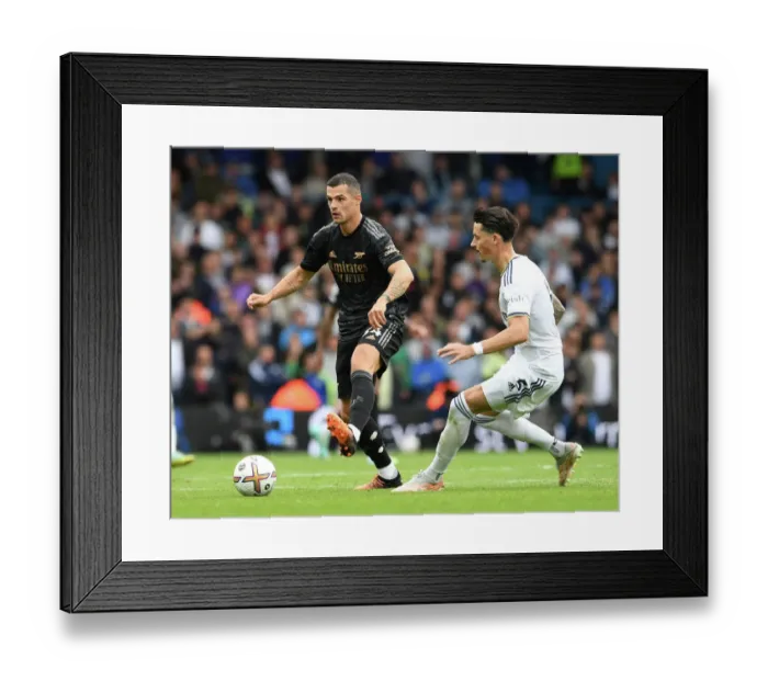 Framed Print : Xhaka vs Koch: Intense Battle in Leeds United vs Arsenal FC Premier League Clash Framed Print : Xhaka vs Koch: Intense Battle in Leeds United vs Arsenal FC Premier League Clash