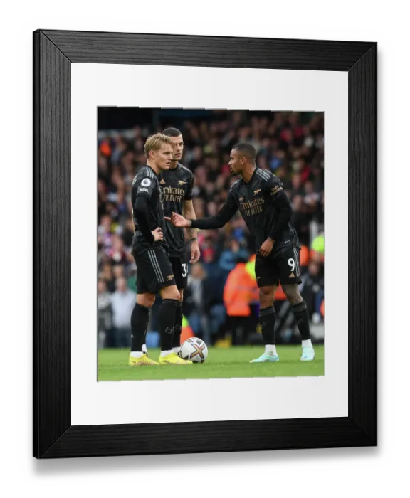 Framed Print : Arsenal's Odegaard, Xhaka, and Jesus in Action against Leeds United (2022-23) Framed Print : Arsenal's Odegaard, Xhaka, and Jesus in Action against Leeds United (2022-23)