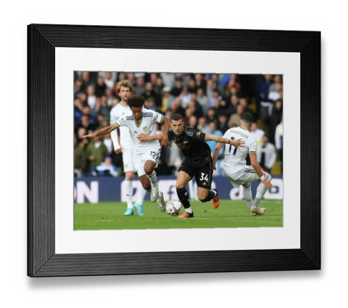 Framed Print : Xhaka Faces Off Against Leeds Duo in Intense Arsenal-Leeds Clash (2022-23 Premier League)