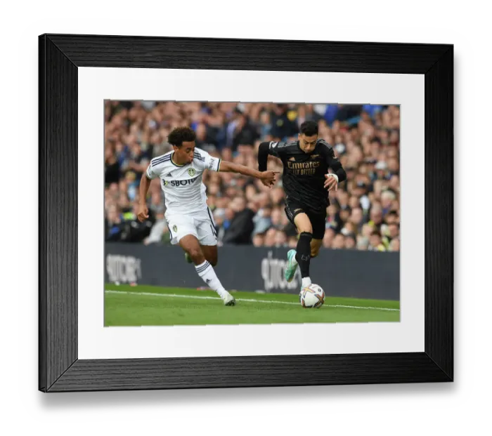 Framed Print : Martinelli vs. Adams: Leeds United vs. Arsenal FC - Premier League Showdown